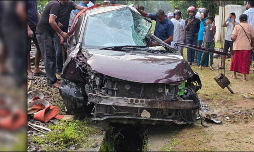 Car swept away by floodwaters collides with train Car swept away by floodwaters collides with train